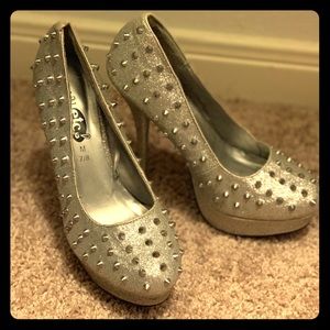 Silver spiked heels